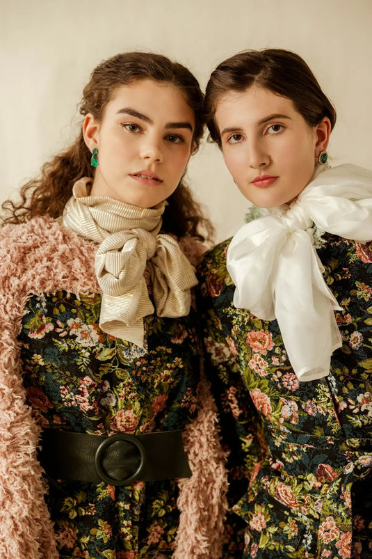 two young women standing next to each other
