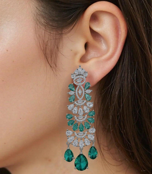 Aqua green crystal brass drop earrings studded with American Diamond-style stones by GARIMAS.