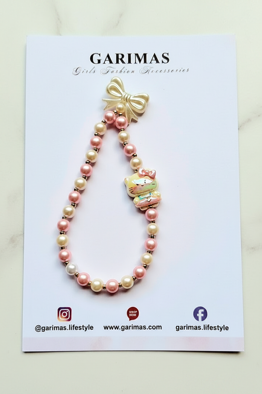 Hello Kitty mobile charm features a glossy beaded wrist strap adorned with an iridescent bow\