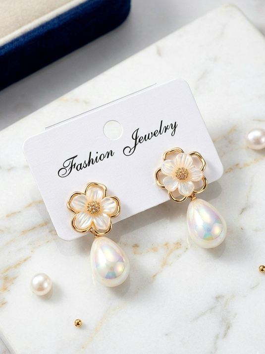 GARIMAS floral drop earrings with gold-tone flower tops and iridescent teardrop dangles