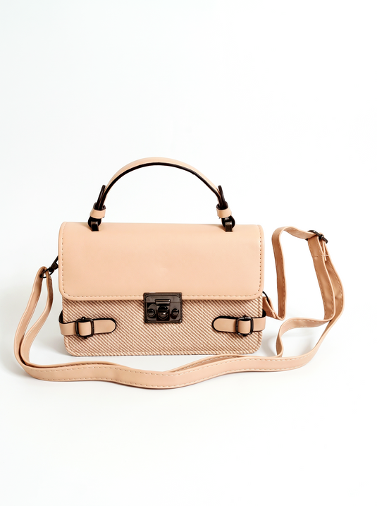 GARIMAS blush pink faux leather satchel handbag on a matte white background