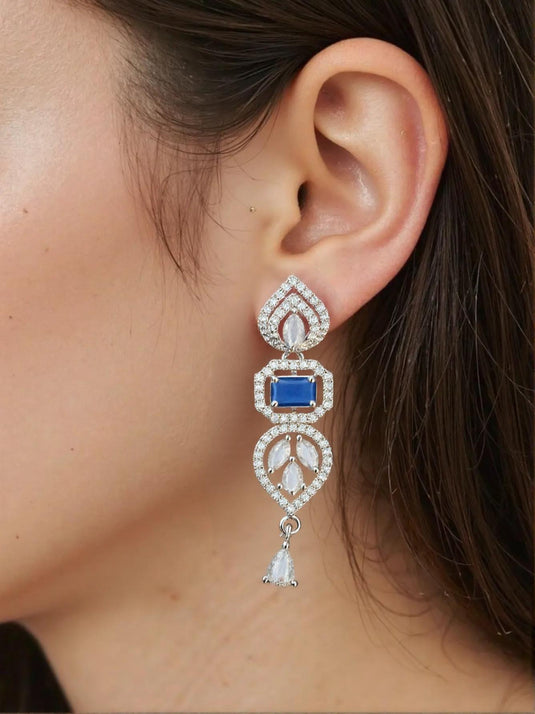 Blue stone drop earrings with American Diamond-style detailing, fashion jewellery by GARIMAS.