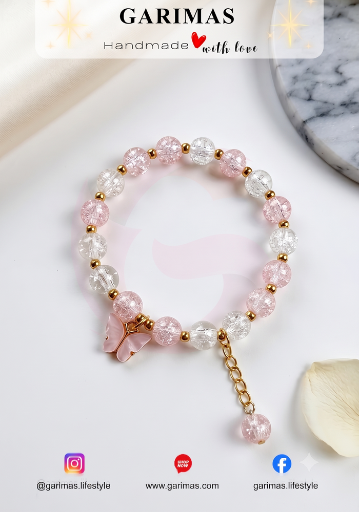 Sparkle glass bead tassel bracelet with a cute enamel butterfly charm by GARIMAS.