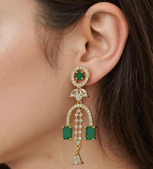 Gold-plated earrings featuring green stones and American Diamond-style accents by GARIMAS.