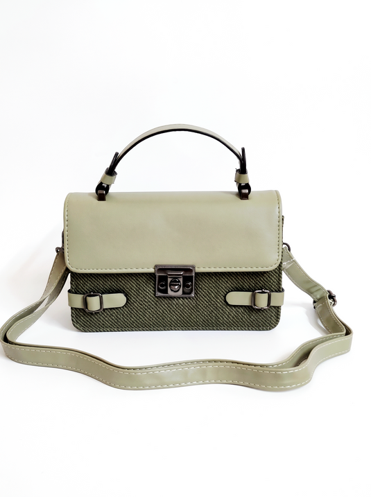 GARIMAS sage green faux leather satchel handbag on a matte white background