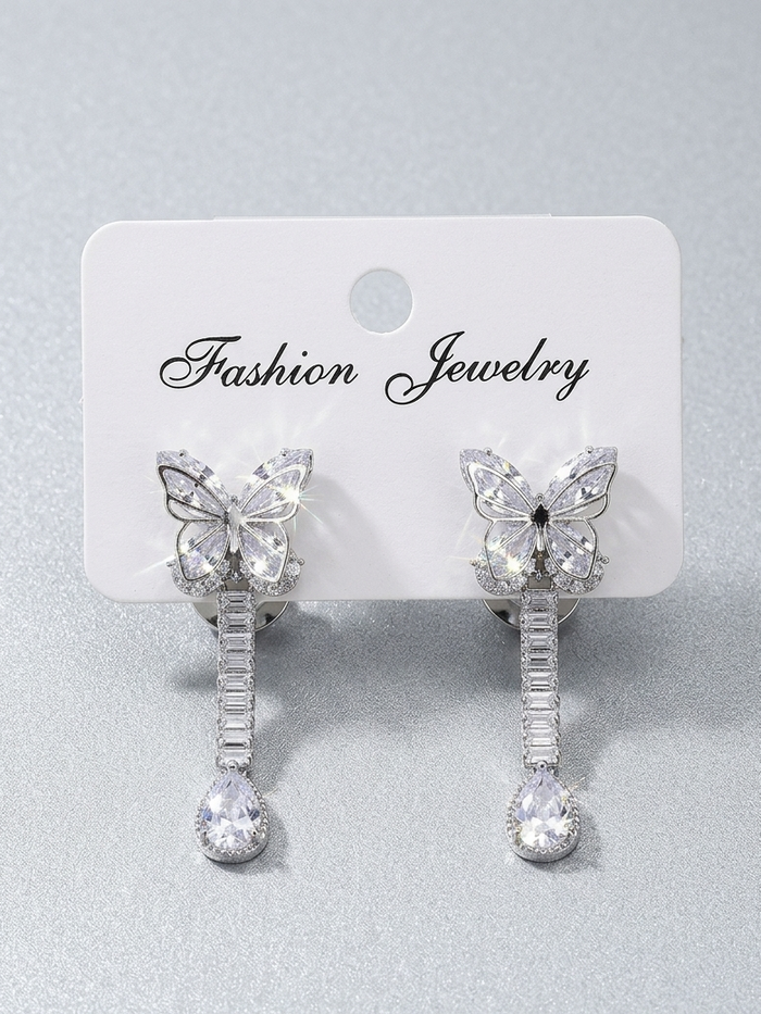 Handmade Turkish butterfly drop earrings with decorative butterfly-shaped design by GARIMAS.